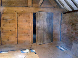 We found a nice old door and re-hung it here