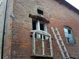 Gently lowering a window frame