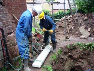 Moving a lintel into position