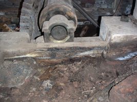 The main bearing resting on rotten timber.