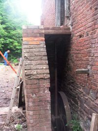 Newly chamfered bricks in the hay-loft steps