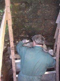 Martyn repairs the end pit wall.