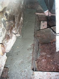 Another section of concrete underpinning